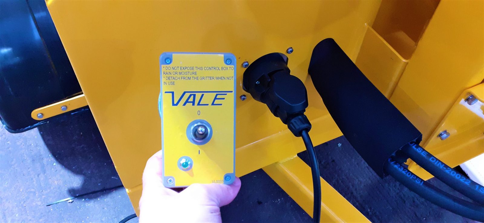 The TS800DC Tug-Towed Salt Spreader has a self-powered control box on a wander lead from the spreader to start and stop the spreading action