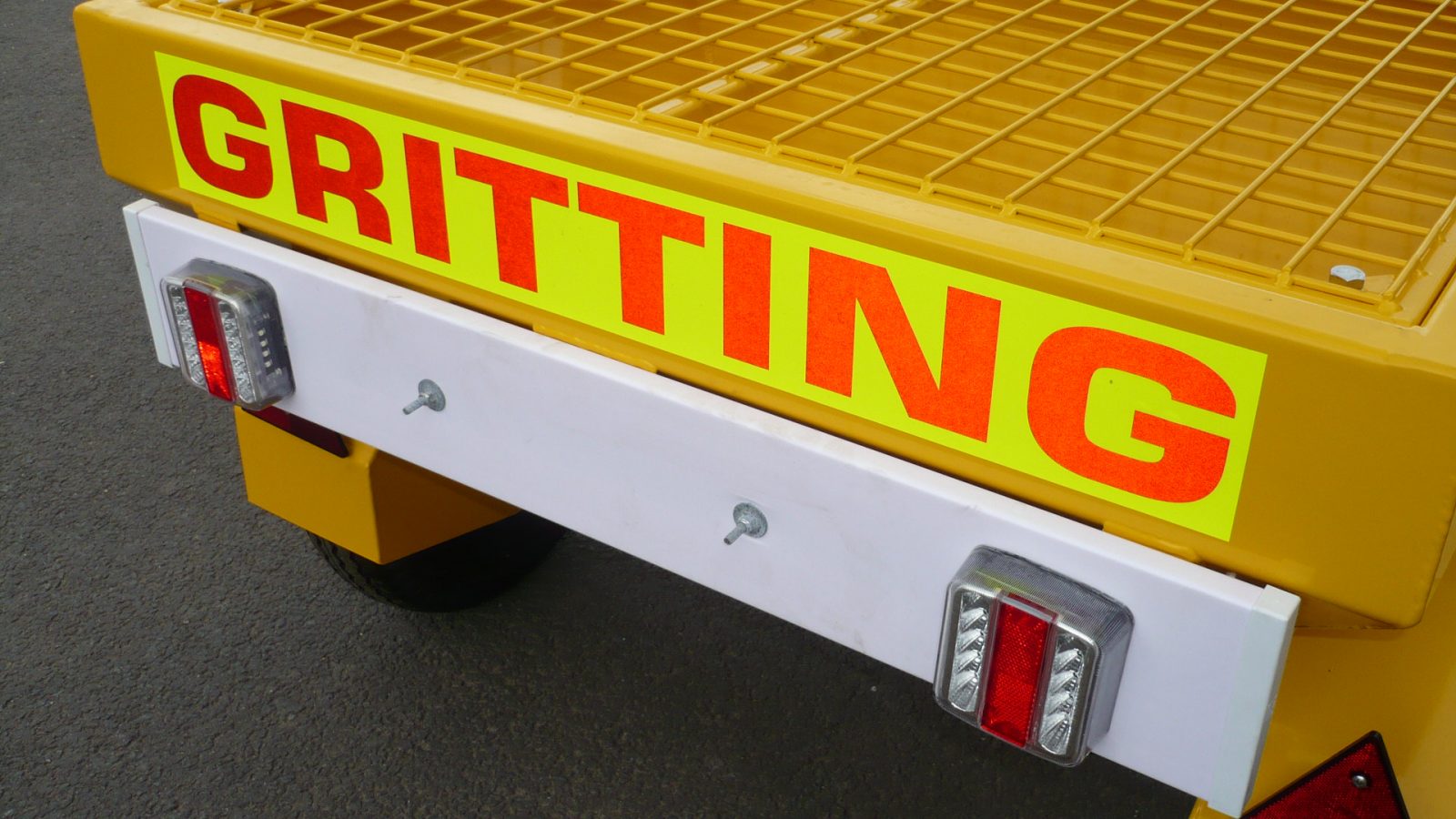 Towed or Mounted Drop Gritter TS80 has fluorescent markings on the rear and full road lighting with high quality LED lighting