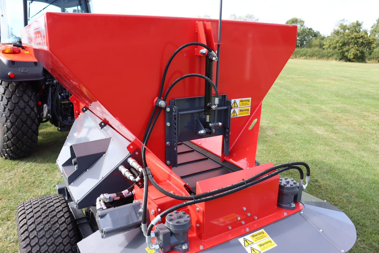 StarGreen TD1500T Trailed Turf Care Top Dresser from VALE Engineering with multi position rear hydraulic back door/gate.