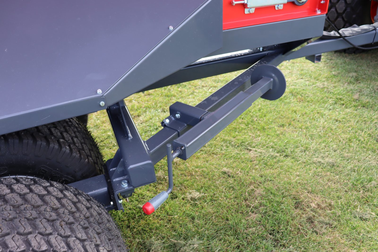 StarGreen TD1500T Trailed Turf Care Top Dresser from VALE Engineering features an adjustable height prop stand, shown here in the stowed position